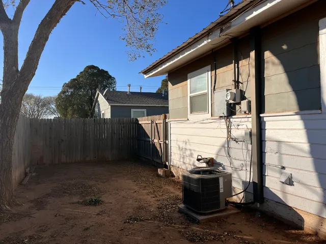 a kitchen with granite countertop a stove and a sink