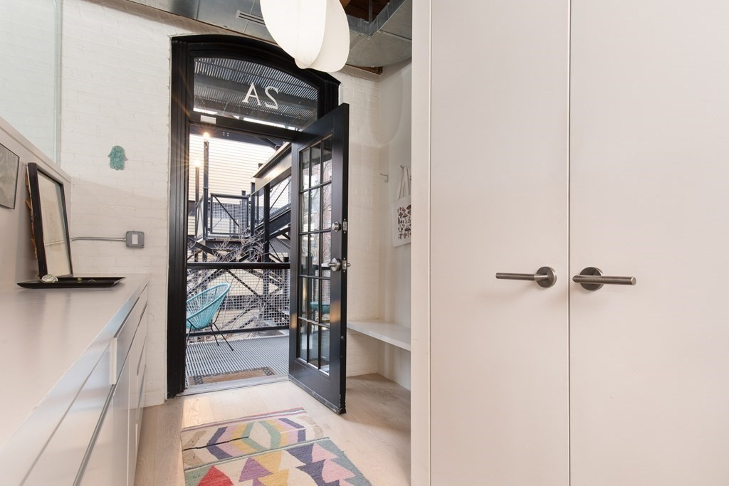 1 Tannery Brook Row, Unit 2A Somerville, MA 02144 - Photo 16 of 18 a view of walk in closet