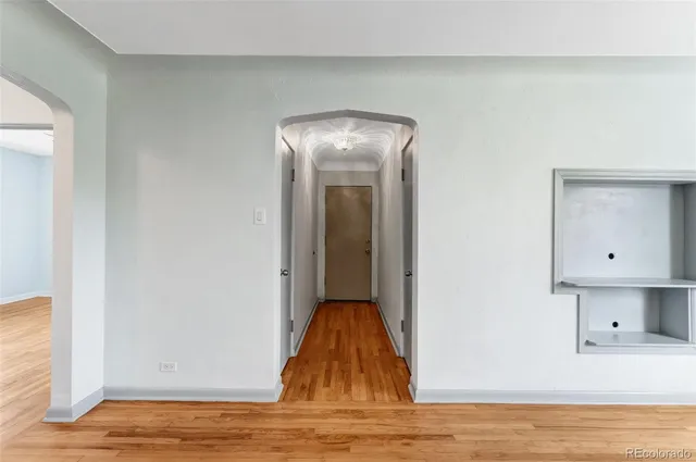 a view of a livingroom with wooden floor