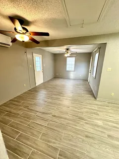 a view of a livingroom with a window