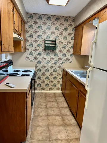 a utility room with washer and dryer