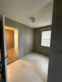 a view of an empty room and window