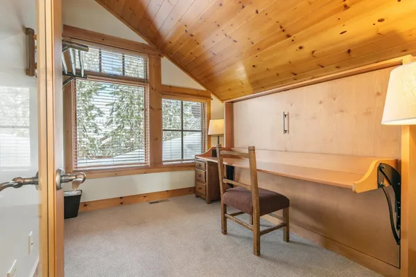 a spacious bathroom with a large tub and shower