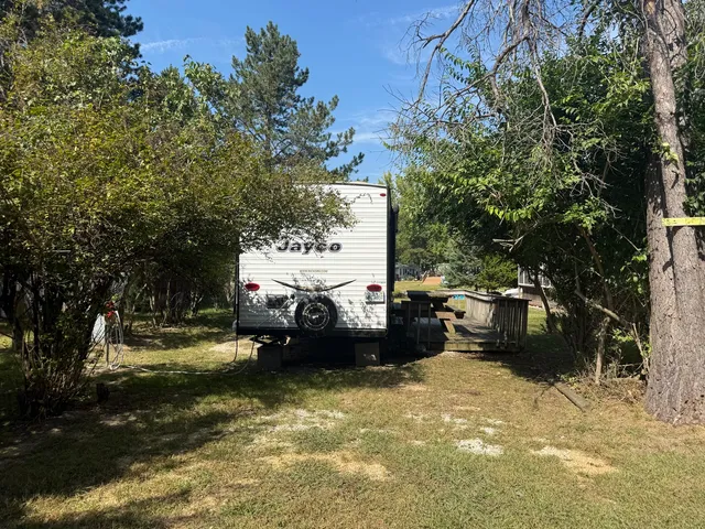 a view of a large body of water with a building in the background