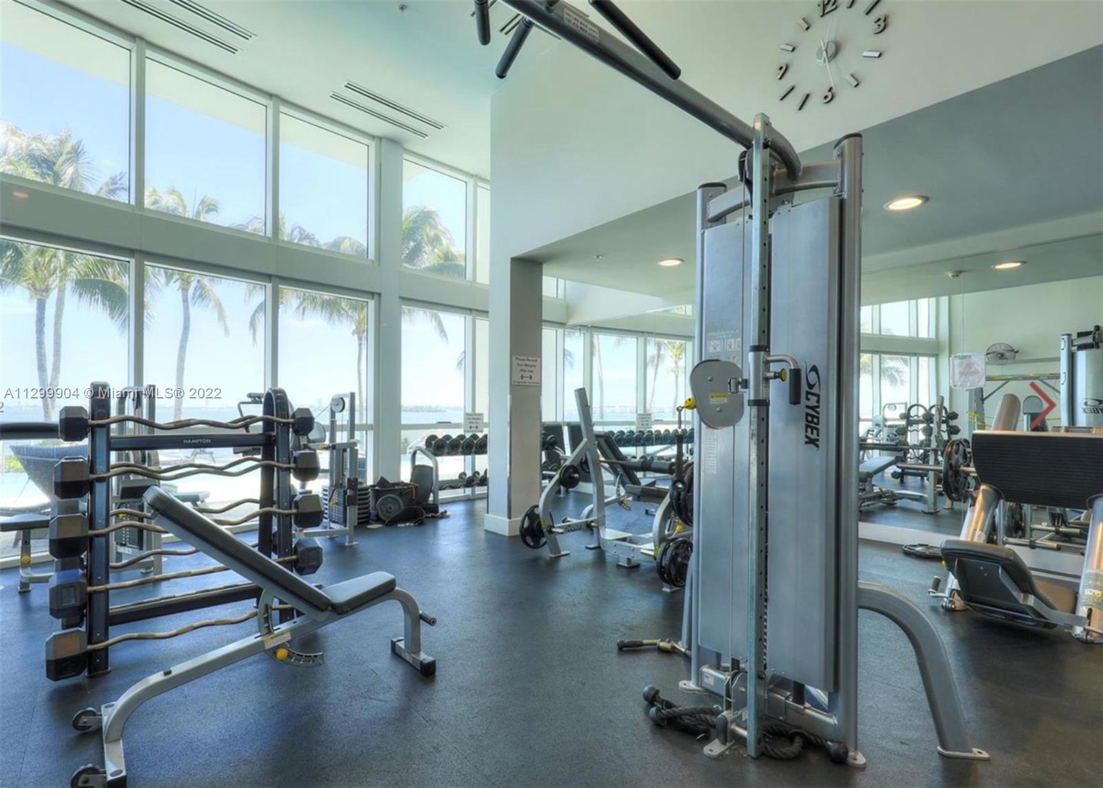 665 Northeast 25th Street, Unit 2104 Miami, FL 33137 - Photo 32 of 38 a view of a room with gym equipment