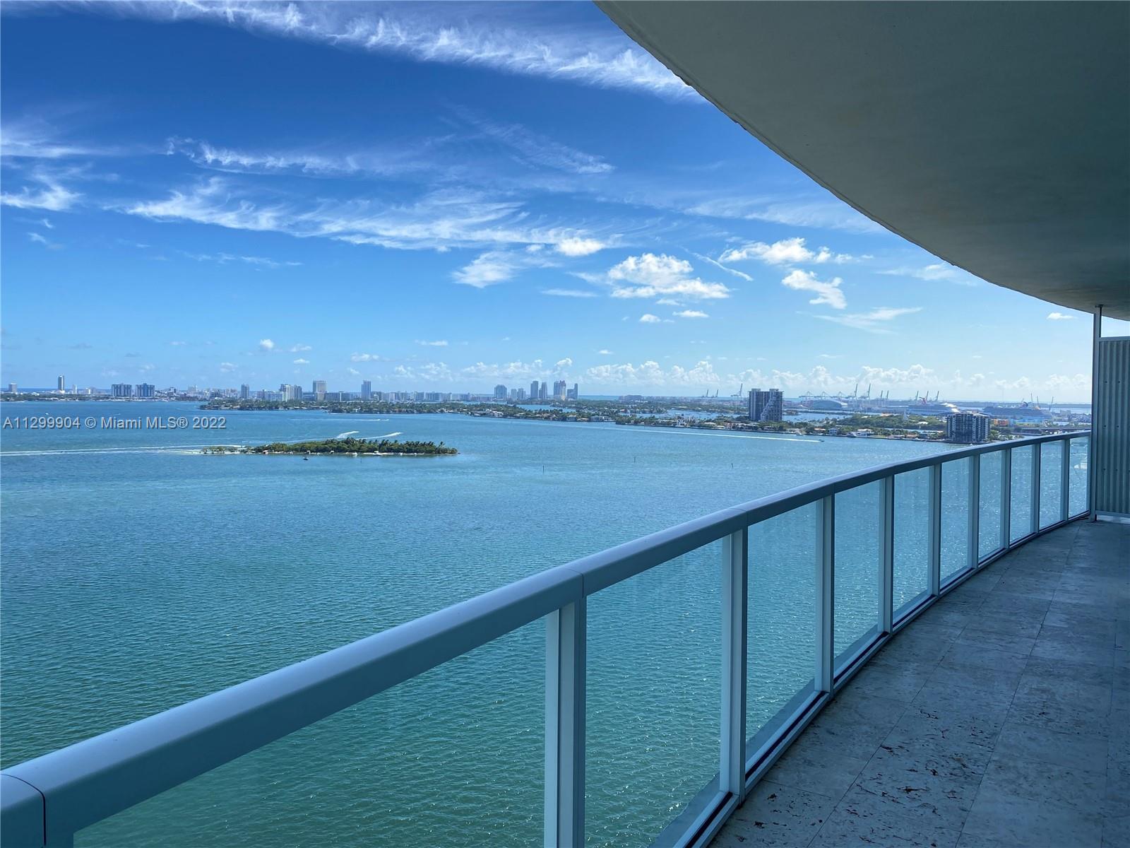 665 Northeast 25th Street, Unit 2104 Miami, FL 33137 - Photo 4 of 38 a view of ocean from a balcony