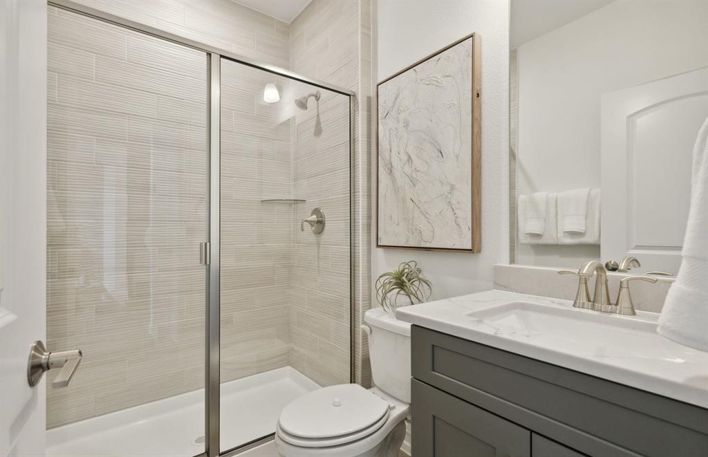 1608 Bennett Drive Anna, TX 75409 - Photo 7 of 11 Spacious secondary bathroom *Model Representation*