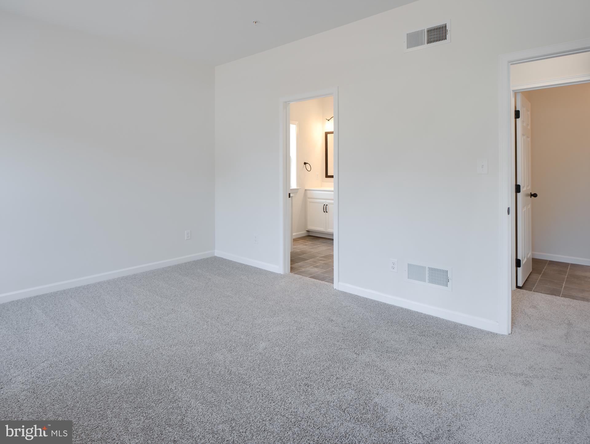 707007728 Hook Road, Unit SAVANNAH Westminster, MD 21157 - Photo 8 of 18 a view of empty room