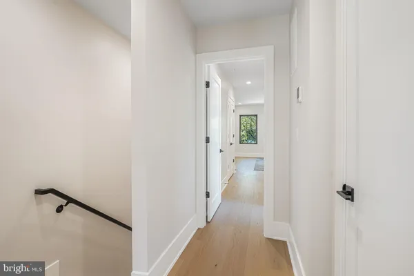 a view of a bathroom from the hallway