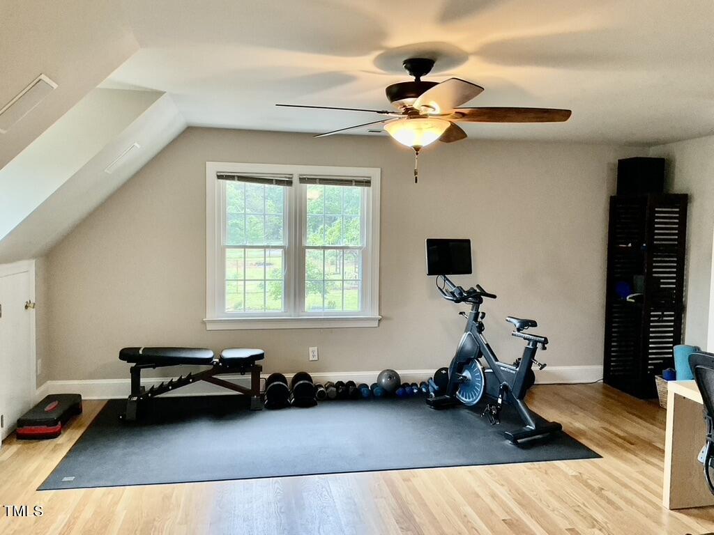 4209 Old Lewis Farm Road Raleigh, NC 27604 - Photo 21 of 47 a room with gym equipment and a window