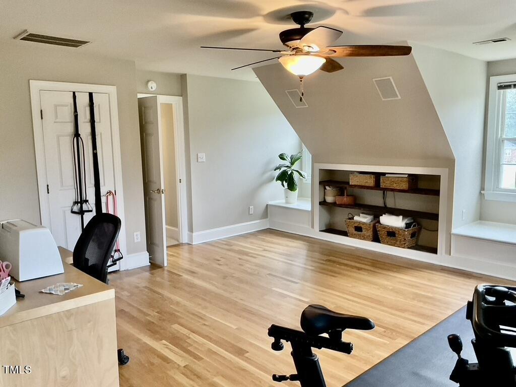 4209 Old Lewis Farm Road Raleigh, NC 27604 - Photo 22 of 47 a room with furniture and a chandelier