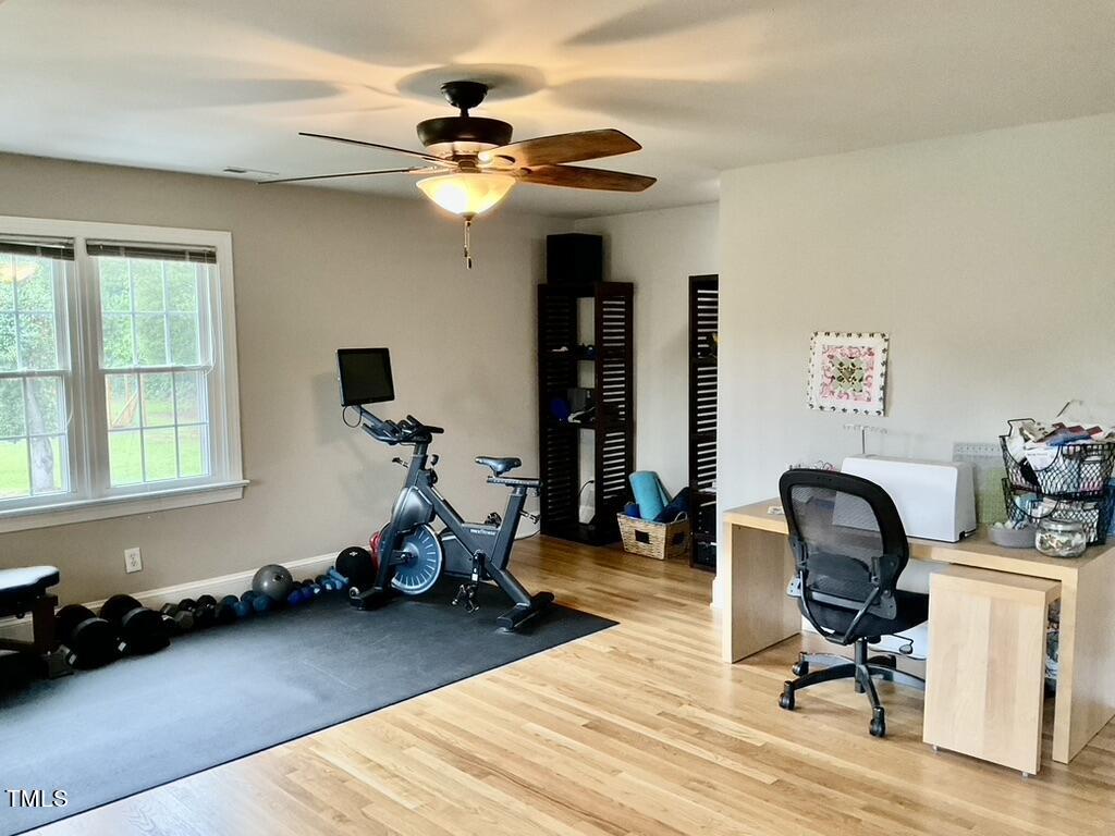 4209 Old Lewis Farm Road Raleigh, NC 27604 - Photo 24 of 47 a room with gym equipment and a window