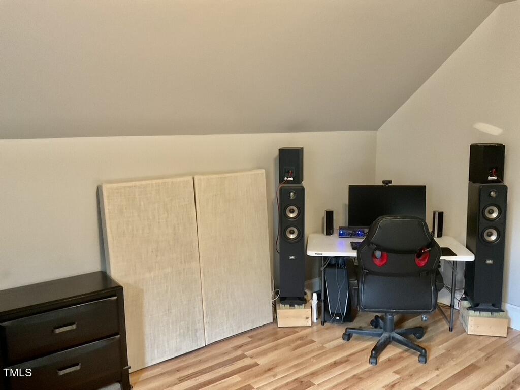 4209 Old Lewis Farm Road Raleigh, NC 27604 - Photo 28 of 47 a workspace with furniture and wooden floor