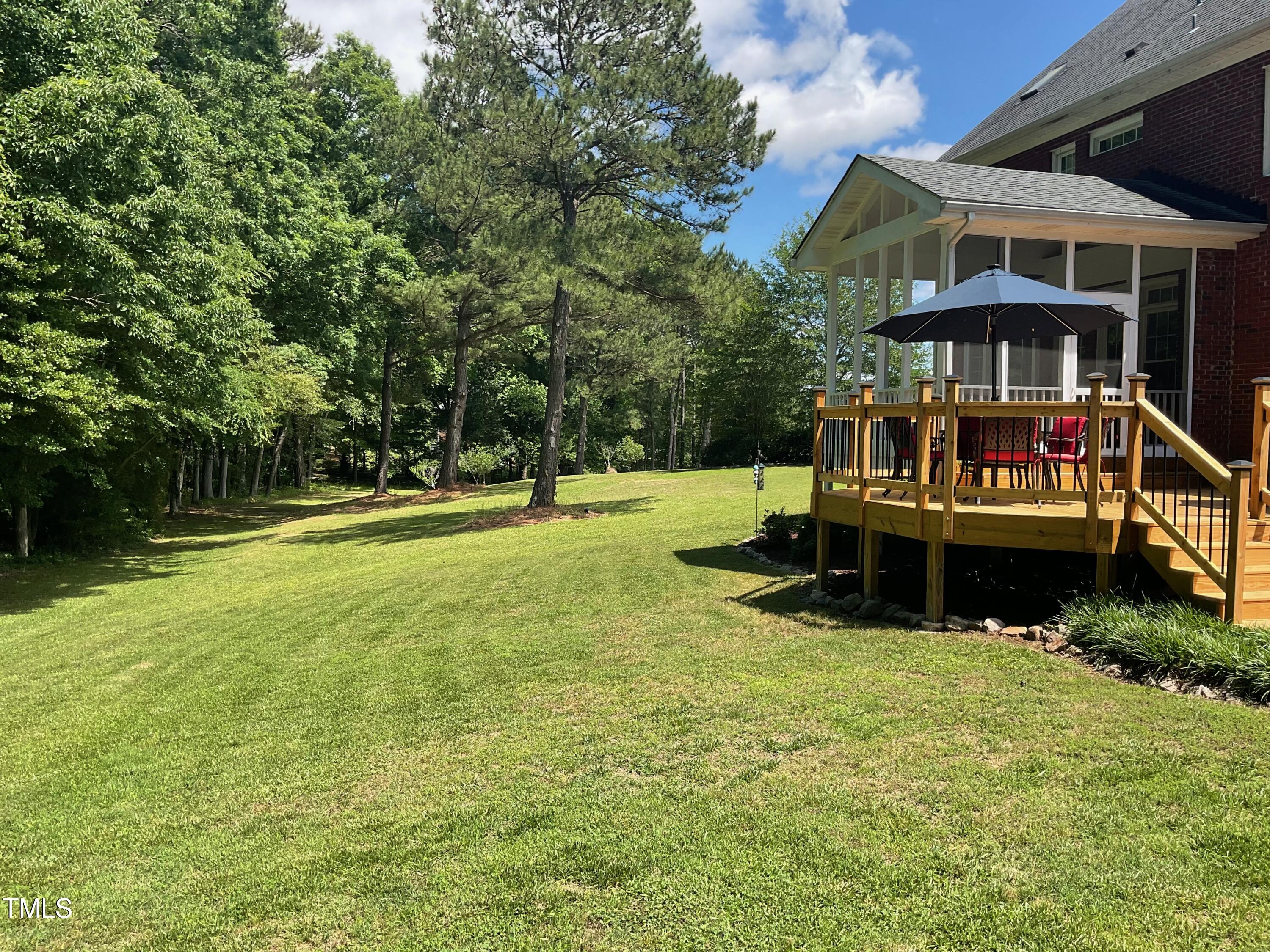 4209 Old Lewis Farm Road Raleigh, NC 27604 - Photo 37 of 47 a view of a house with a yard