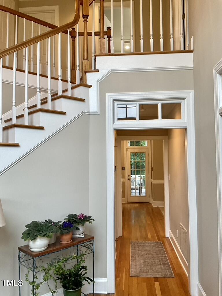 4209 Old Lewis Farm Road Raleigh, NC 27604 - Photo 9 of 47 a front view of a house with a lots of windows