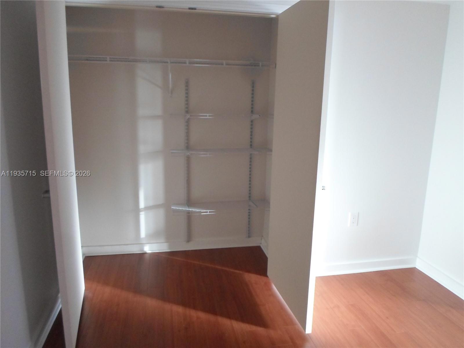 9066 Southwest 73rd Court, Unit 1910 Miami, FL 33156 - Photo 27 of 43 Den closet