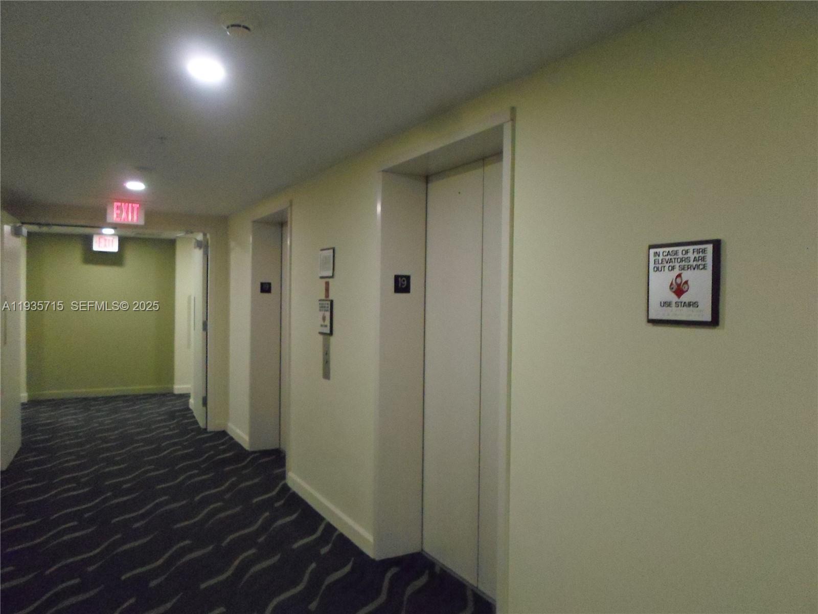 9066 Southwest 73rd Court, Unit 1910 Miami, FL 33156 - Photo 43 of 43 Building hallway