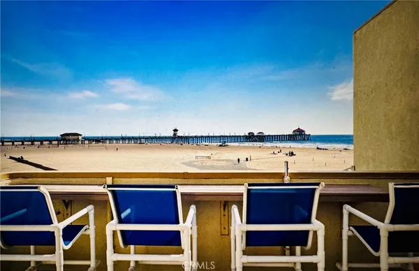 a view of a chairs and table on the terrace