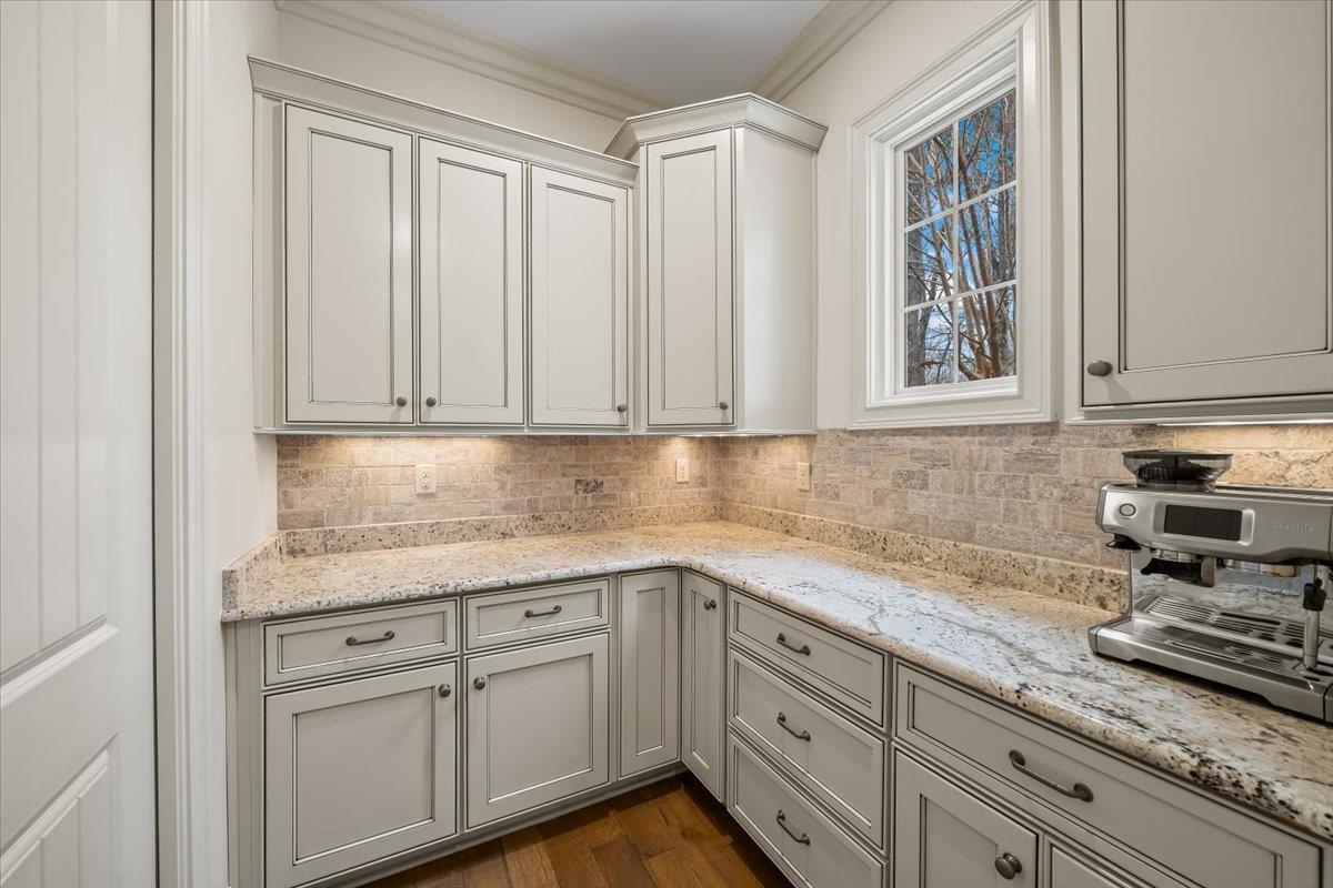 547 Lambs Brook Lane Collierville, TN 38017 - Photo 16 of 40 a kitchen with stainless steel appliances granite countertop white cabinets and a granite counter tops