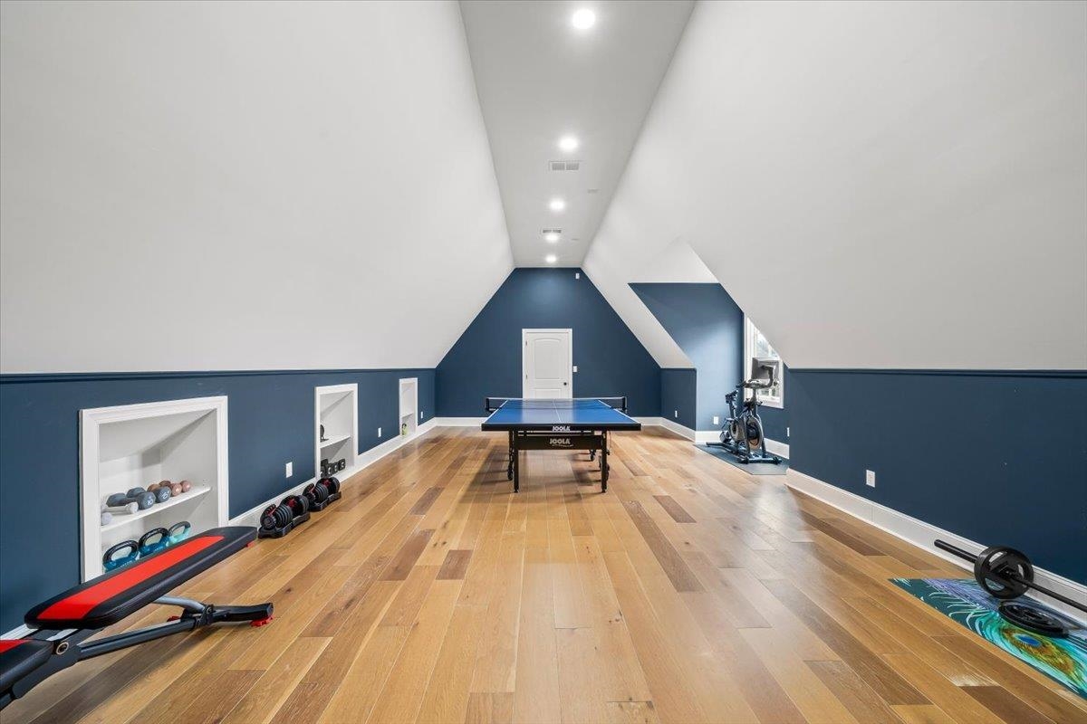 547 Lambs Brook Lane Collierville, TN 38017 - Photo 26 of 40 a spacious bedroom with a bed and dresser