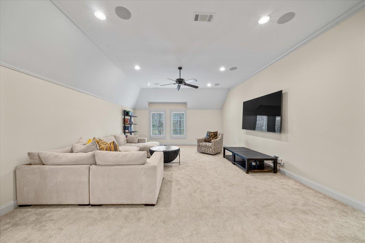 547 Lambs Brook Lane Collierville, TN 38017 - Photo 27 of 40 a living room with furniture and a flat screen tv