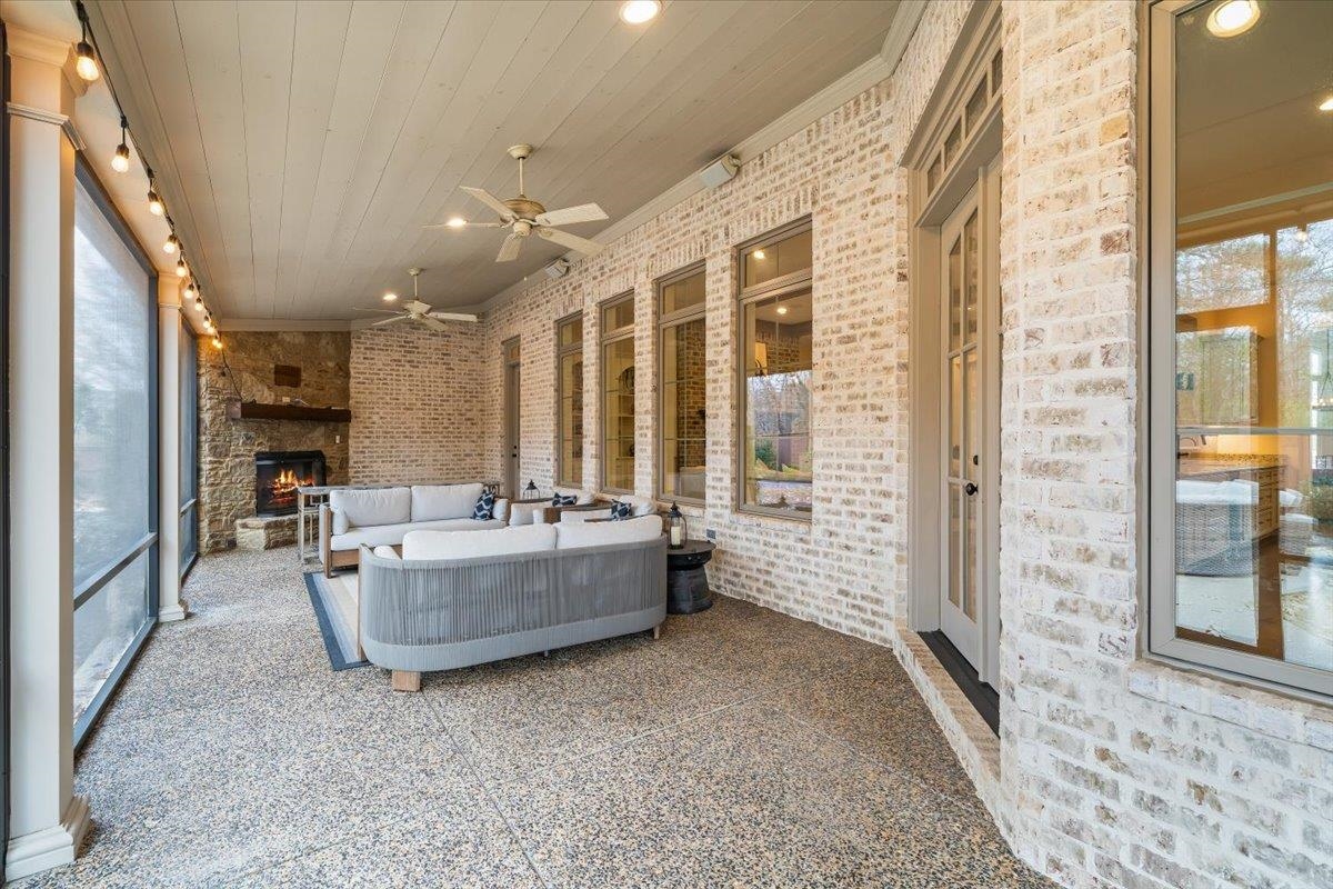 547 Lambs Brook Lane Collierville, TN 38017 - Photo 36 of 40 a living room with furniture and large windows