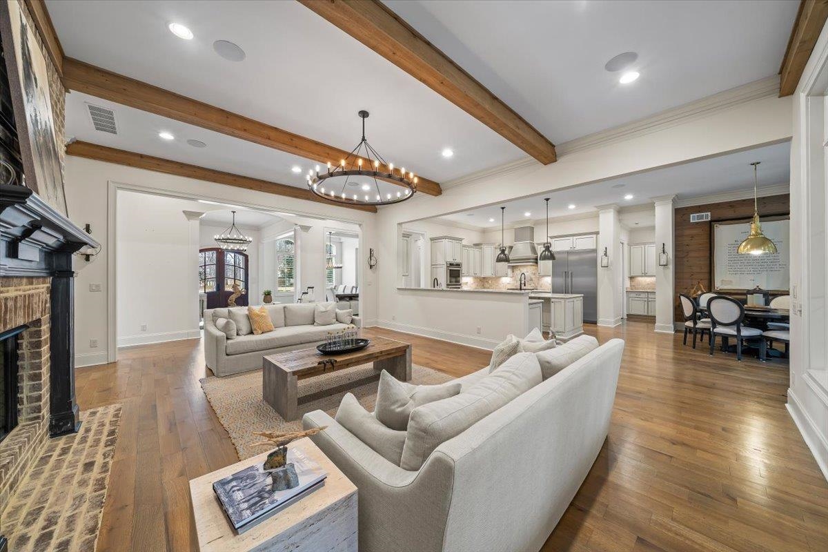 547 Lambs Brook Lane Collierville, TN 38017 - Photo 10 of 40 a living room with furniture and a wooden floor