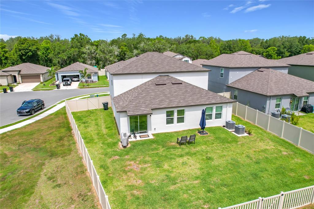 1633 Red Loop Lakeland, FL 33801 - Photo 48 of 60 a view of a house with a yard