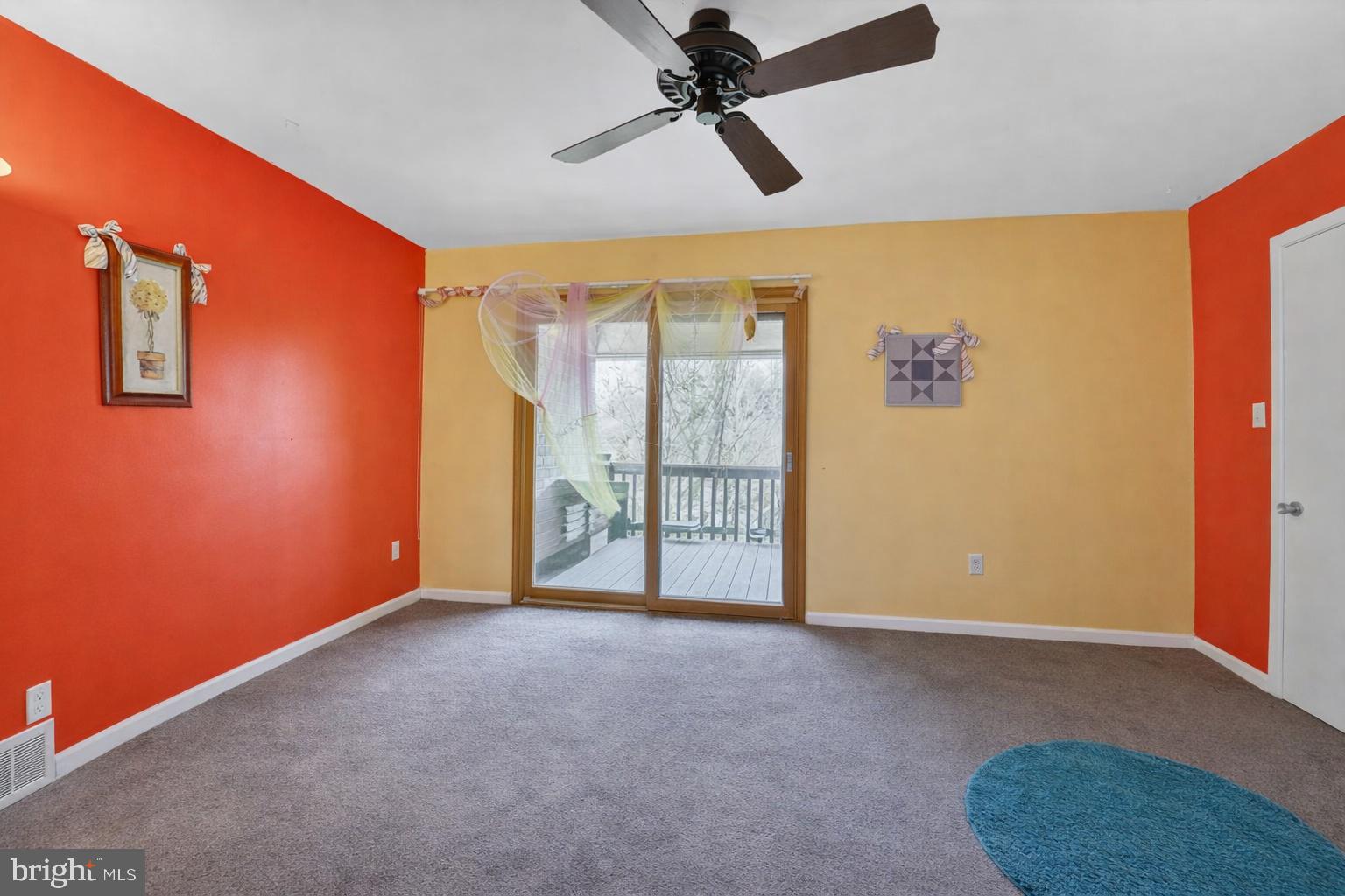 9214 Three Oaks Drive Silver Spring, MD 20901 - Photo 11 of 14 an empty room with windows