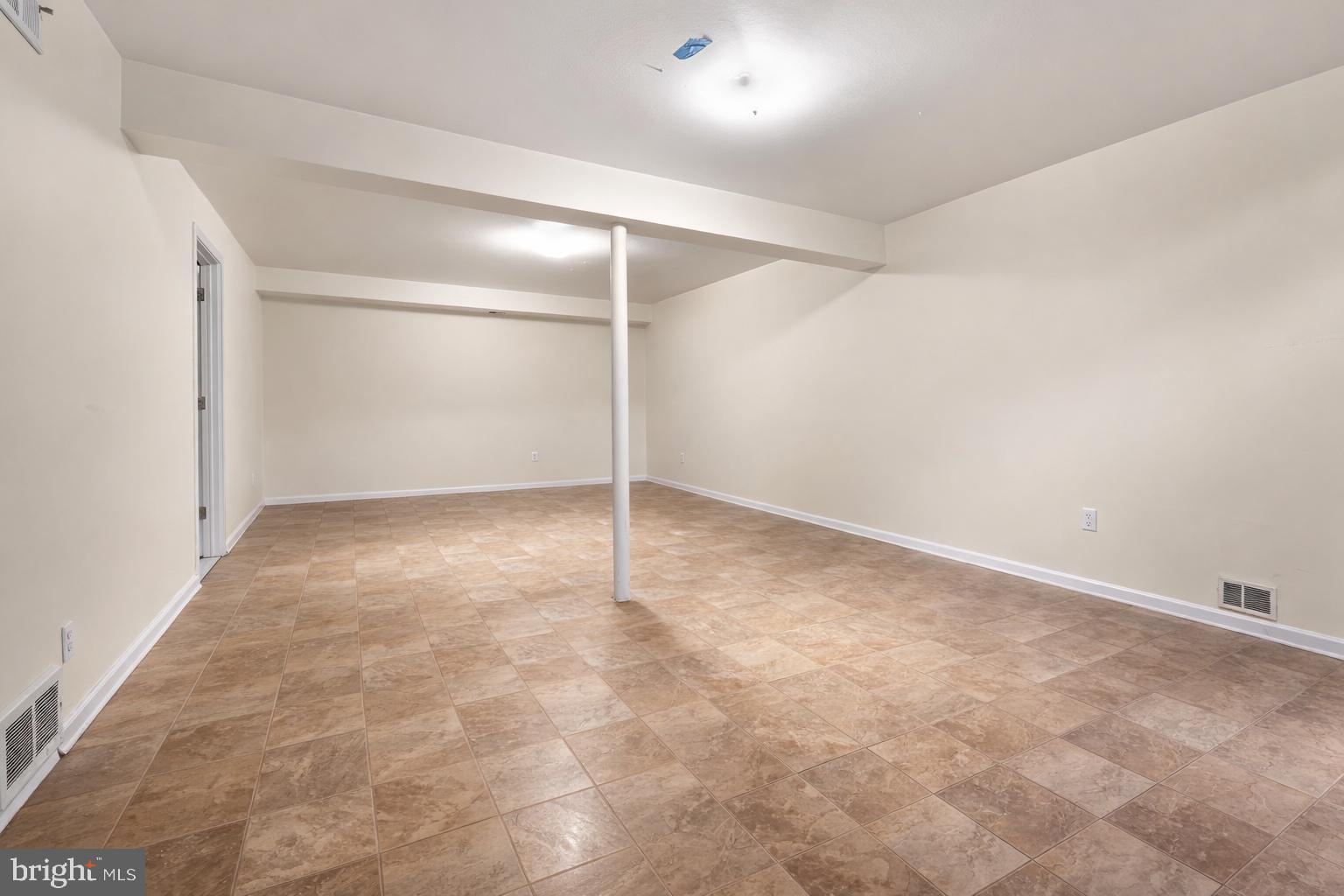 9214 Three Oaks Drive Silver Spring, MD 20901 - Photo 6 of 14 a view of an empty room