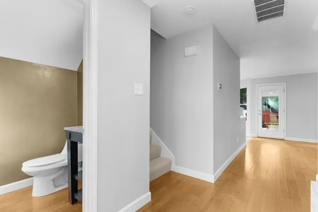 a view of entryway with wooden floor