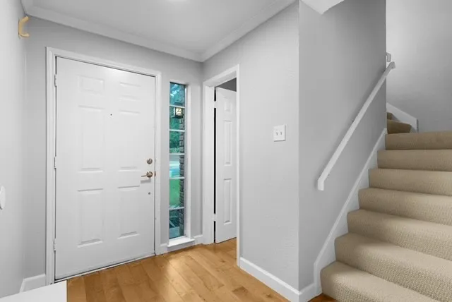 a view of entryway with bathroom
