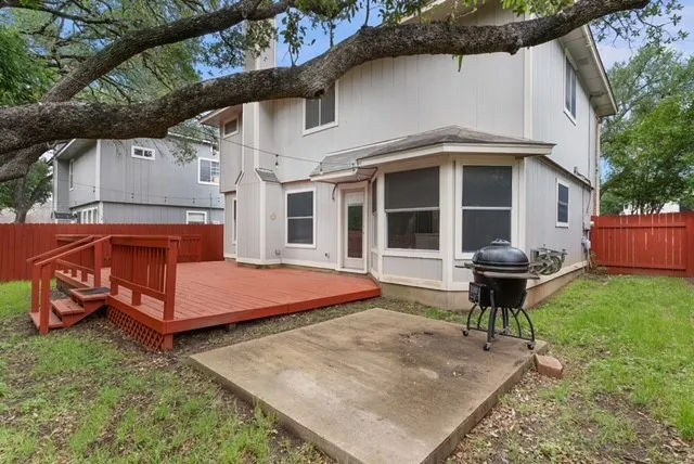a view of backyard with a garden and entertaining space