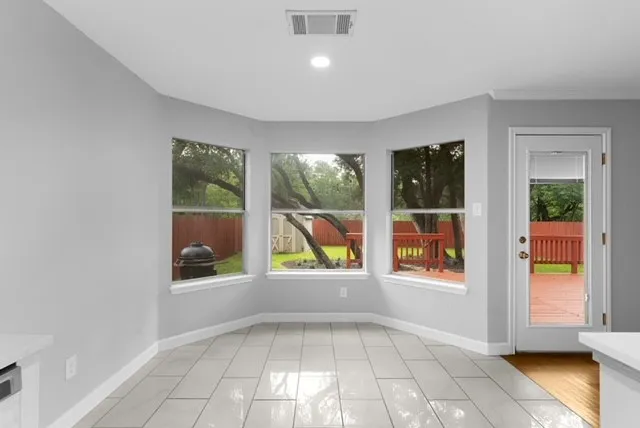 an empty room with windows