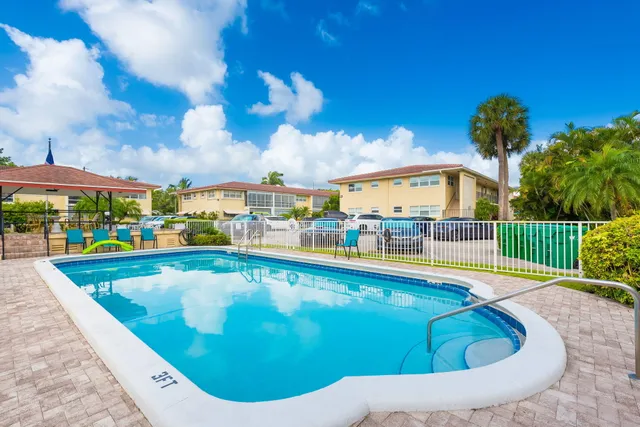 a view of a swimming pool and outdoor space