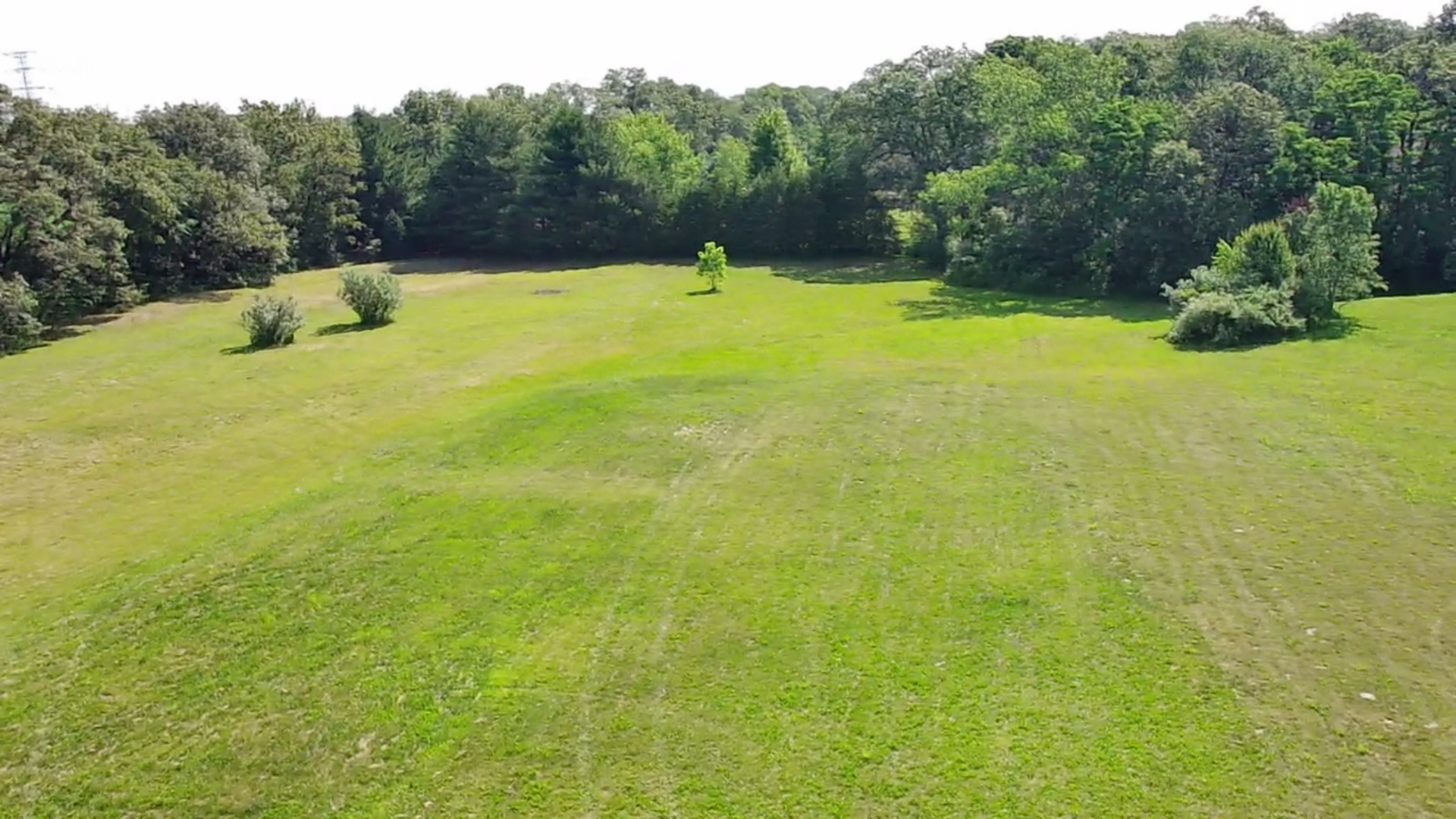 Lot 25 North 16000w Road Essex, IL 60935 - Photo 2 of 5 a view of a swimming pool with an outdoor seating and a yard