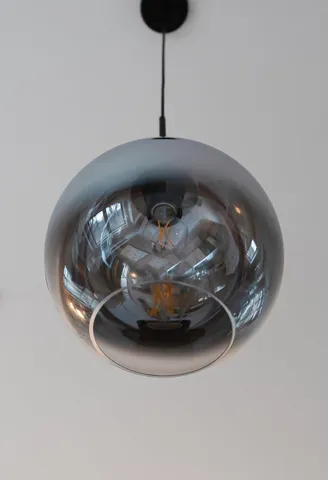 a kitchen with a stove sink and a refrigerator