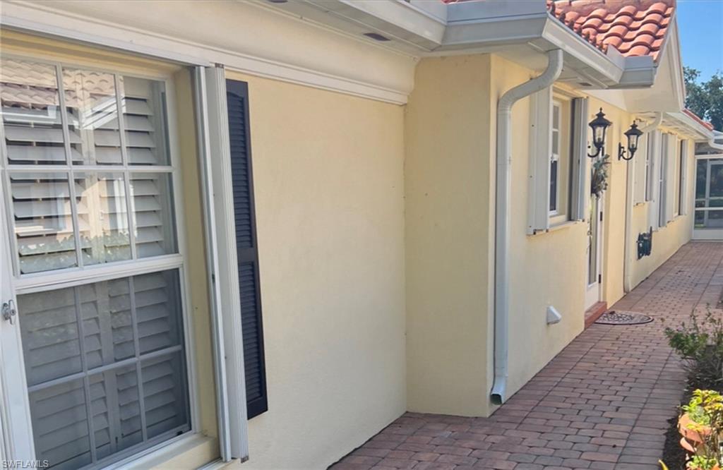 5433 Guadeloupe Way Naples, FL 34119 - Photo 2 of 16 a view of a front door of the house