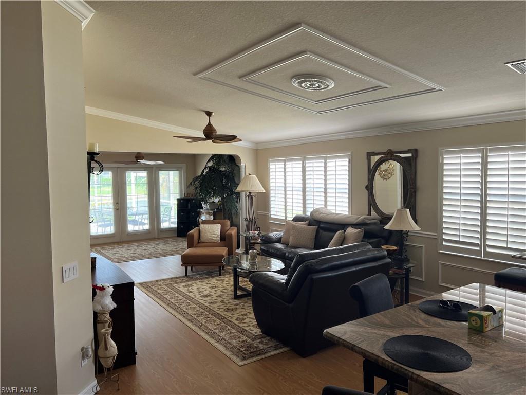 5433 Guadeloupe Way Naples, FL 34119 - Photo 9 of 16 a living room with furniture
