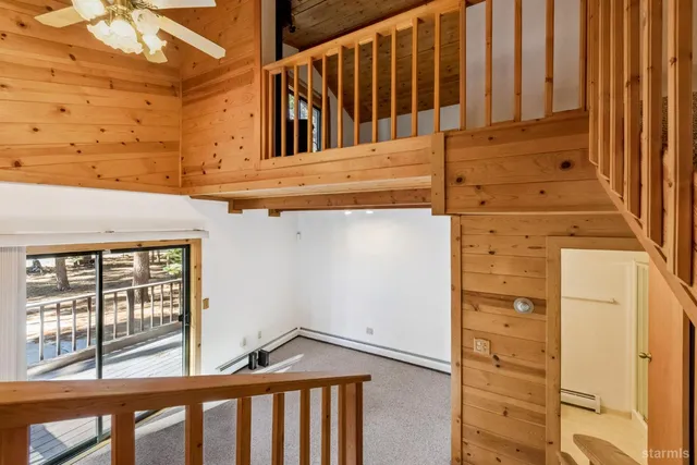 a view of a porch with wooden floor