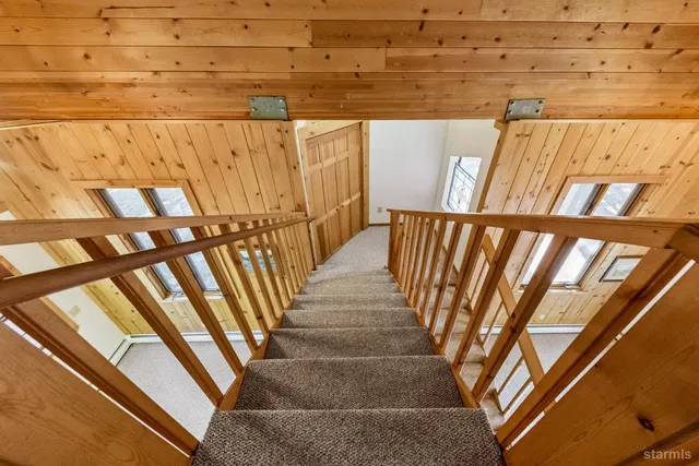 a bathroom with a shower and a bath tub