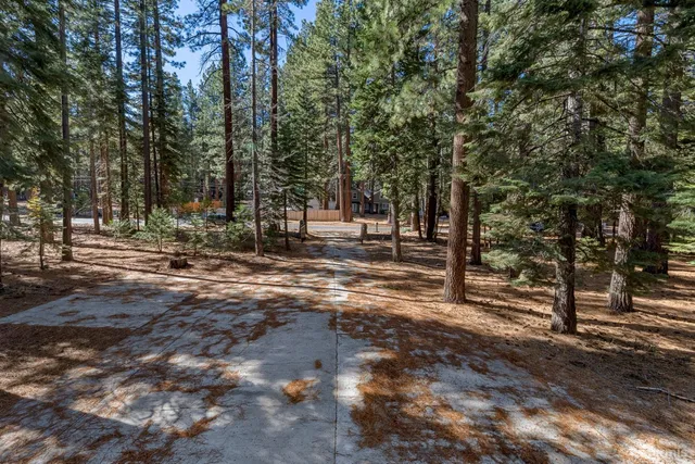 a view of a balcony with wooden floor