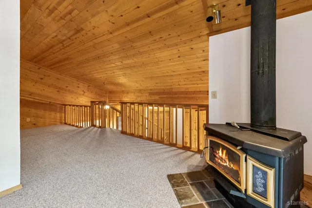 a view of a balcony with furniture
