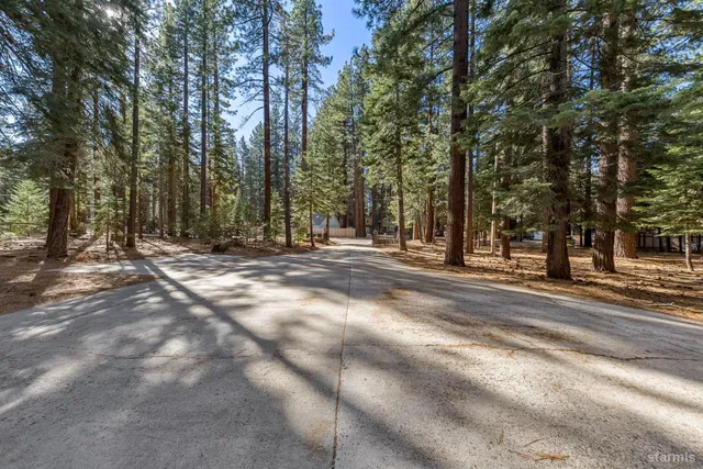 a view of balcony with wooden floor