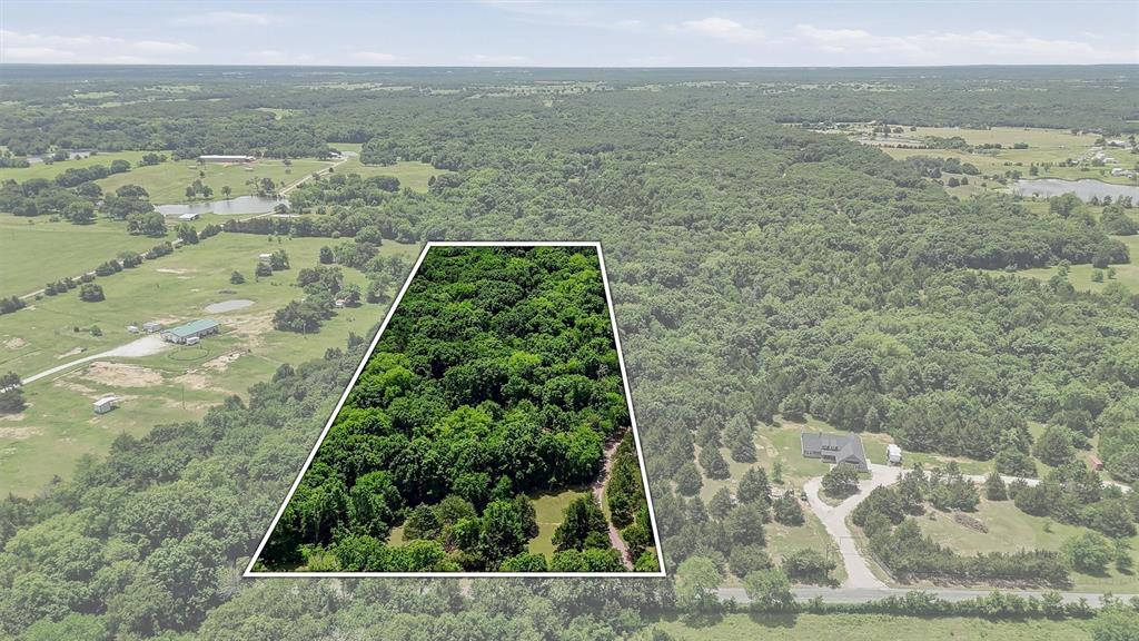 3958 Ranch Road Whitesboro, TX 76273 - Photo 38 of 40 Expansive wooded acreage featuring mature trees and a clear perimeter outline