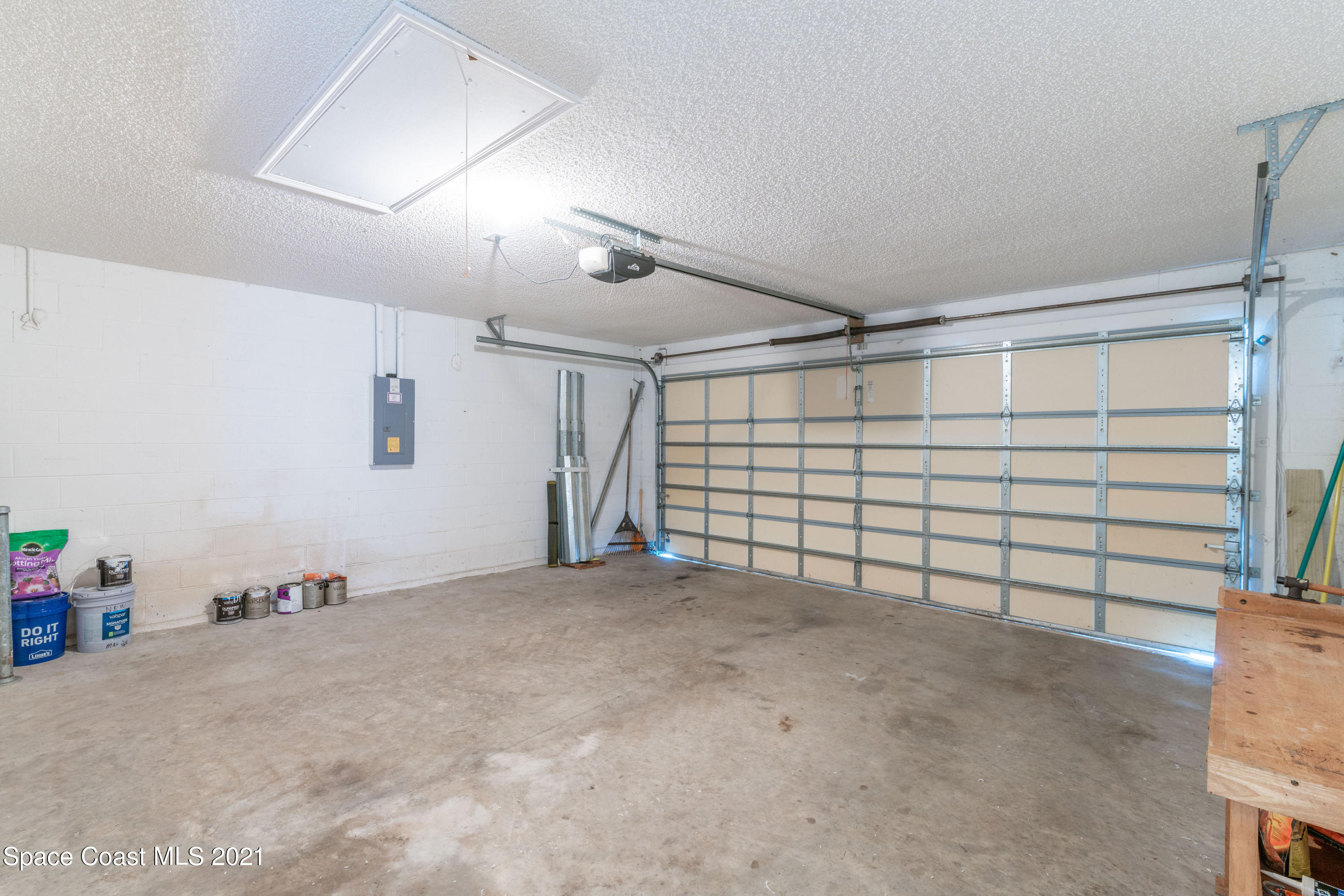 6941 Boston Road Cocoa, FL 32927 - Photo 22 of 22 Large Garage with Metal Storm Panels