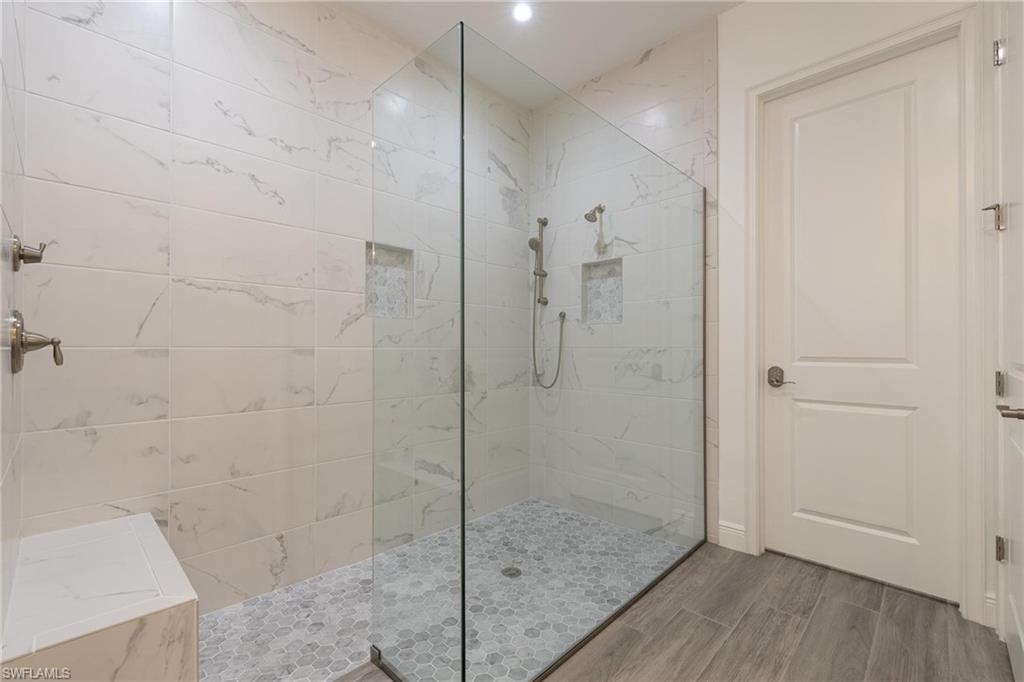 3664 Pilot Circle Naples, FL 34120 - Photo 28 of 35 a bathroom with a shower