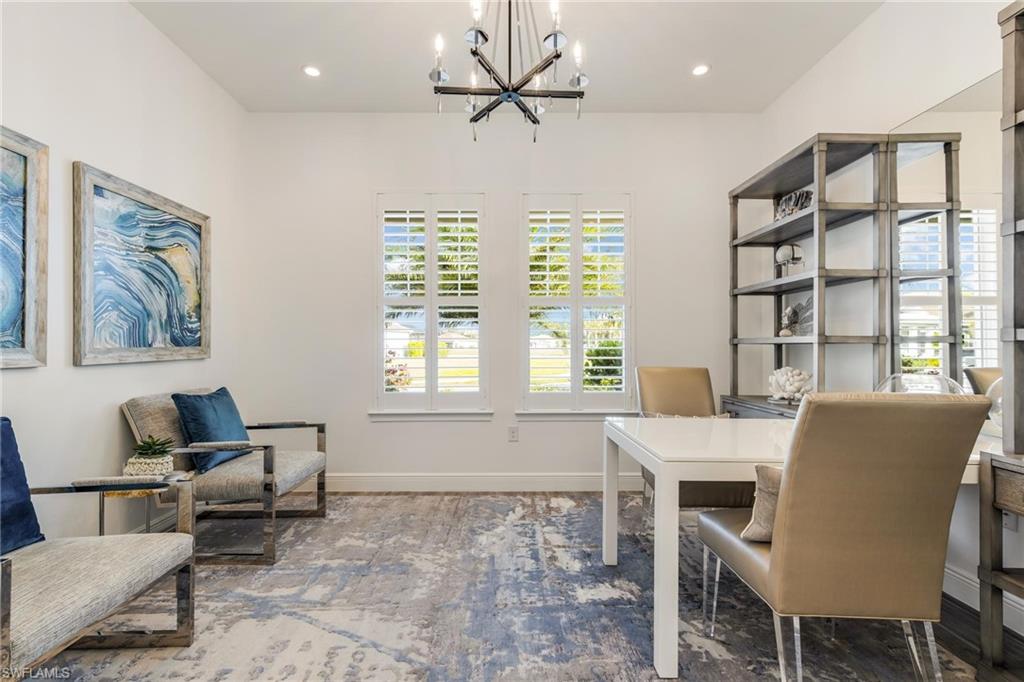 3664 Pilot Circle Naples, FL 34120 - Photo 4 of 35 a view of a dining room with furniture window and outside view
