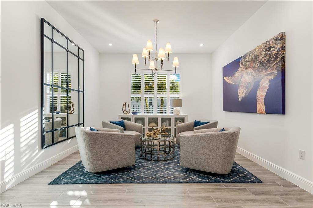 3664 Pilot Circle Naples, FL 34120 - Photo 7 of 35 a living room with furniture and a window