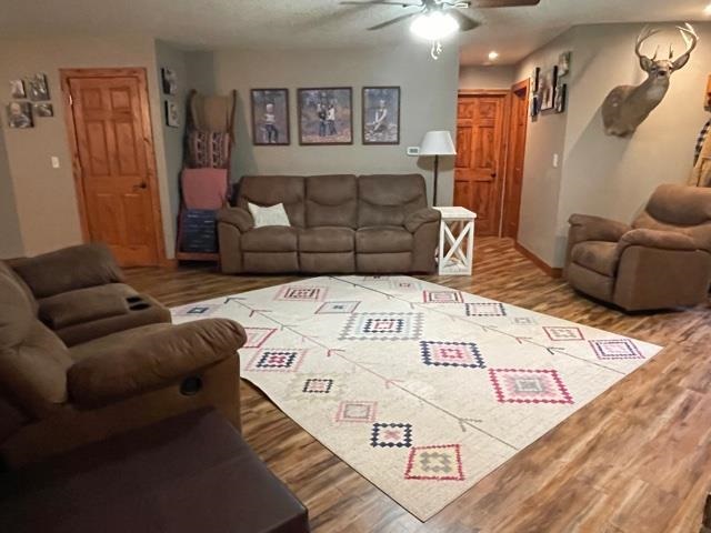 3923 Scenic Bluff Road Thomson, IL 61285 - Photo 13 of 28 a living room with furniture and a rug
